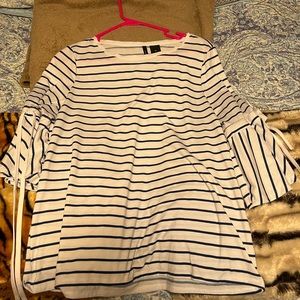 White and navy blouse made by new directions. Size M.